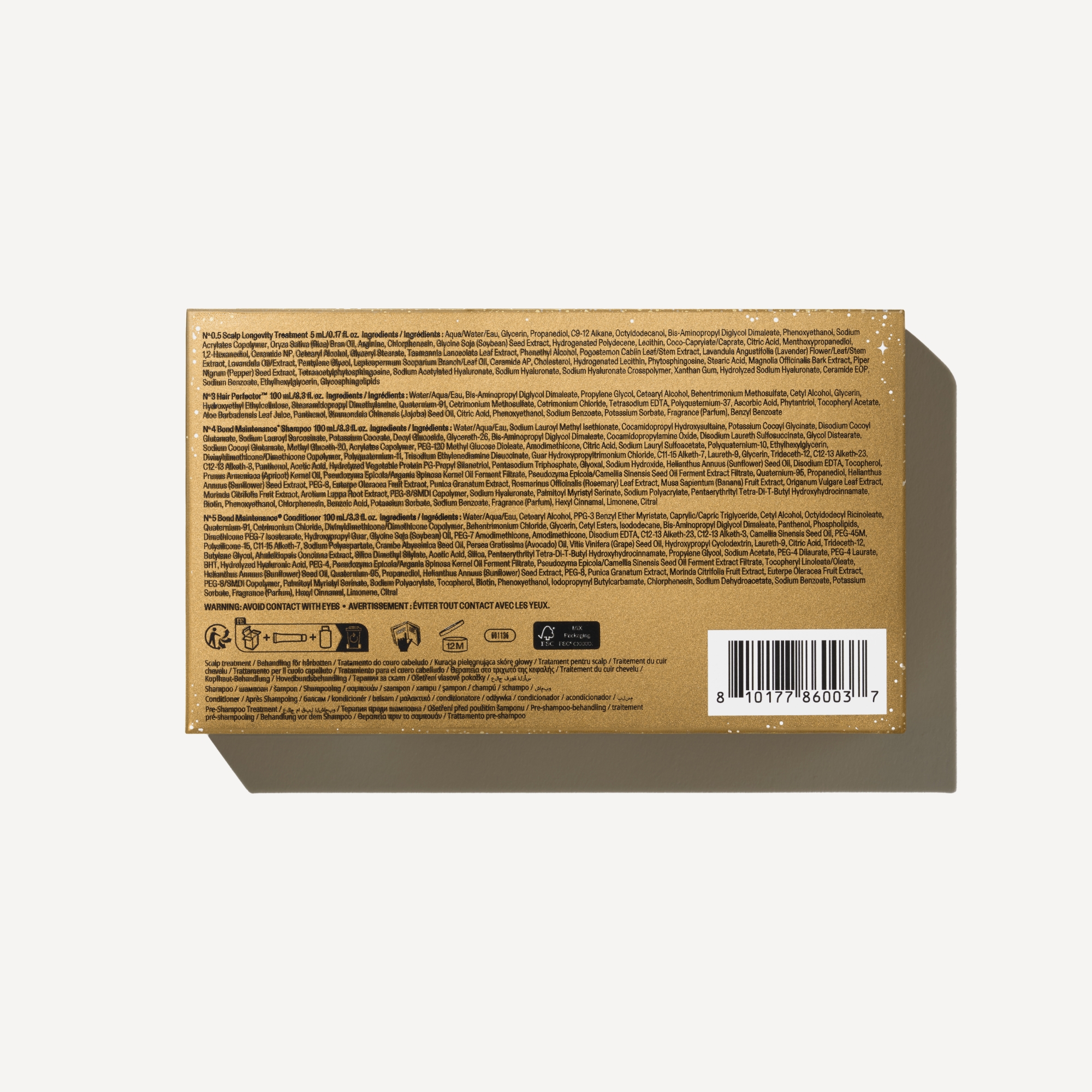 Parte trasera de la caja del kit Olaplex The Greatest Strength Set con la lista de ingredientes e instrucciones de uso detalladas.