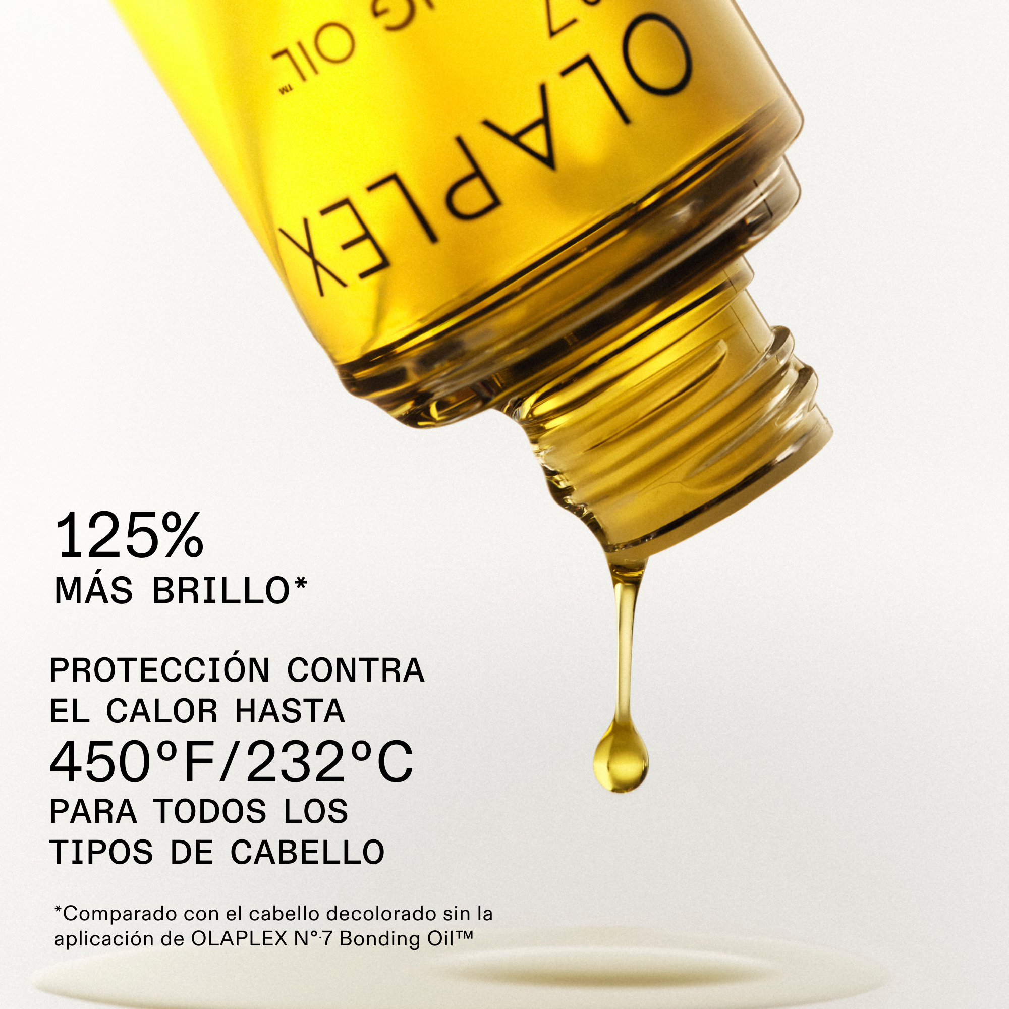 Primer plano del aceite Olaplex Nº.7 mostrando sus beneficios: 125% más brillo y protección térmica hasta 232°C.