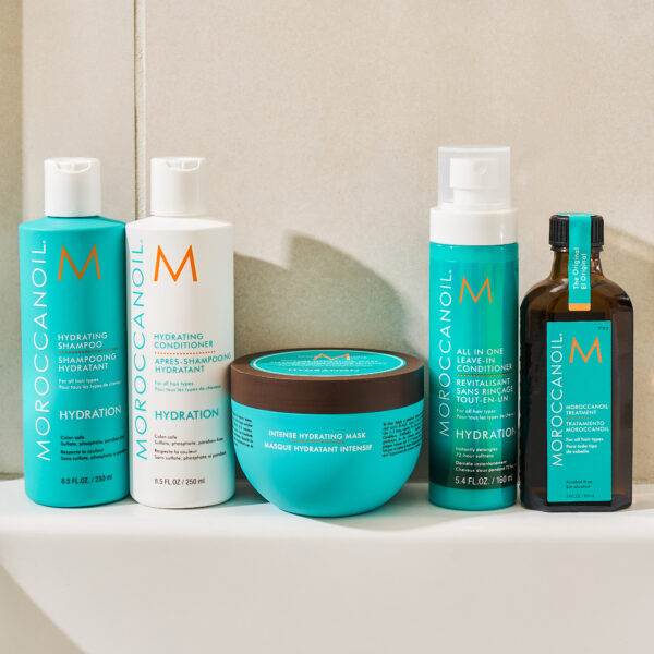 Línea de productos de hidratación de Moroccanoil que incluye champú, acondicionador, mascarilla intensiva, acondicionador sin enjuague y tratamiento con aceite.