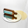 Aceite Moroccanoil Light derramado sobre superficie